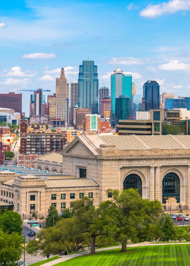 Kansas City skyline with historic building in foreground.