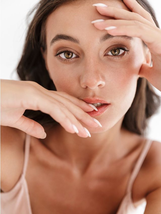 Close-up of a woman with elegant makeup.